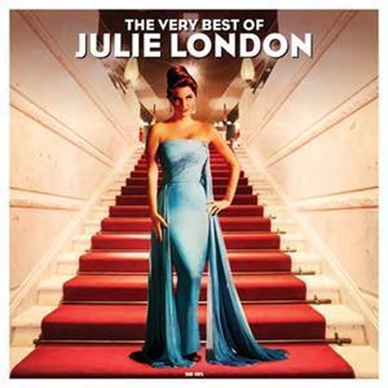 Julie London in een elegante turquoise jurk op een rode loper, met de tekst 'The Very Best of Julie London'.