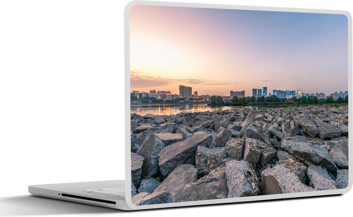 Afbeelding van product SleevesAndCases  Laptop sticker - 11.6 inch - Kapotte betonblokken met Nanchong in China