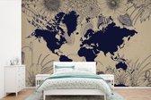 Carte du monde bleu foncé sur fond sablonneux décorée d'illustrations de fleurs 600x400 cm