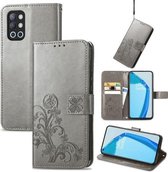 Voor OnePlus 9R Vierbladige sluiting Reliëfgesp Mobiele telefoonbescherming Lederen hoes met lanyard & kaartsleuf & portemonnee & beugelfunctie (grijs)