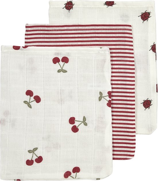 Drie hydrofiele washandjes: wit met kersen, rood gestreept, en wit met lieveheersbeestjes.