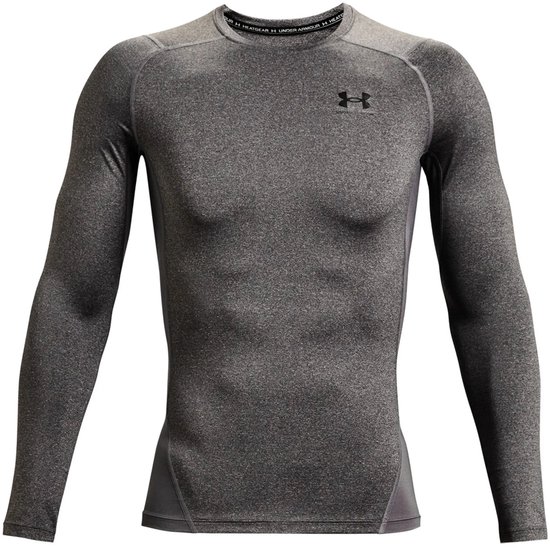 Heren sportshirt van Under Armour in Carbon Heather grijze melange. Langere mouwen en ronde hals.