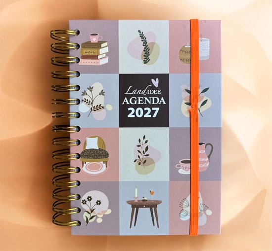 Agenda 2027 met illustraties van boeken, planten en kopjes koffie, met oranje elastiek.