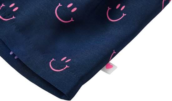 Donkerblauwe rok met een all-over print van roze lachende gezichtjes. Een klein roze hartje is zichtbaar op het label.