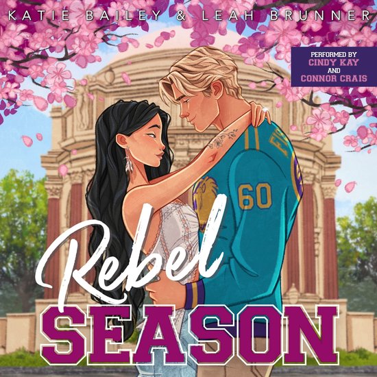 Een man en vrouw omhelzen elkaar voor een gebouw, met 'Rebel Season' erop.