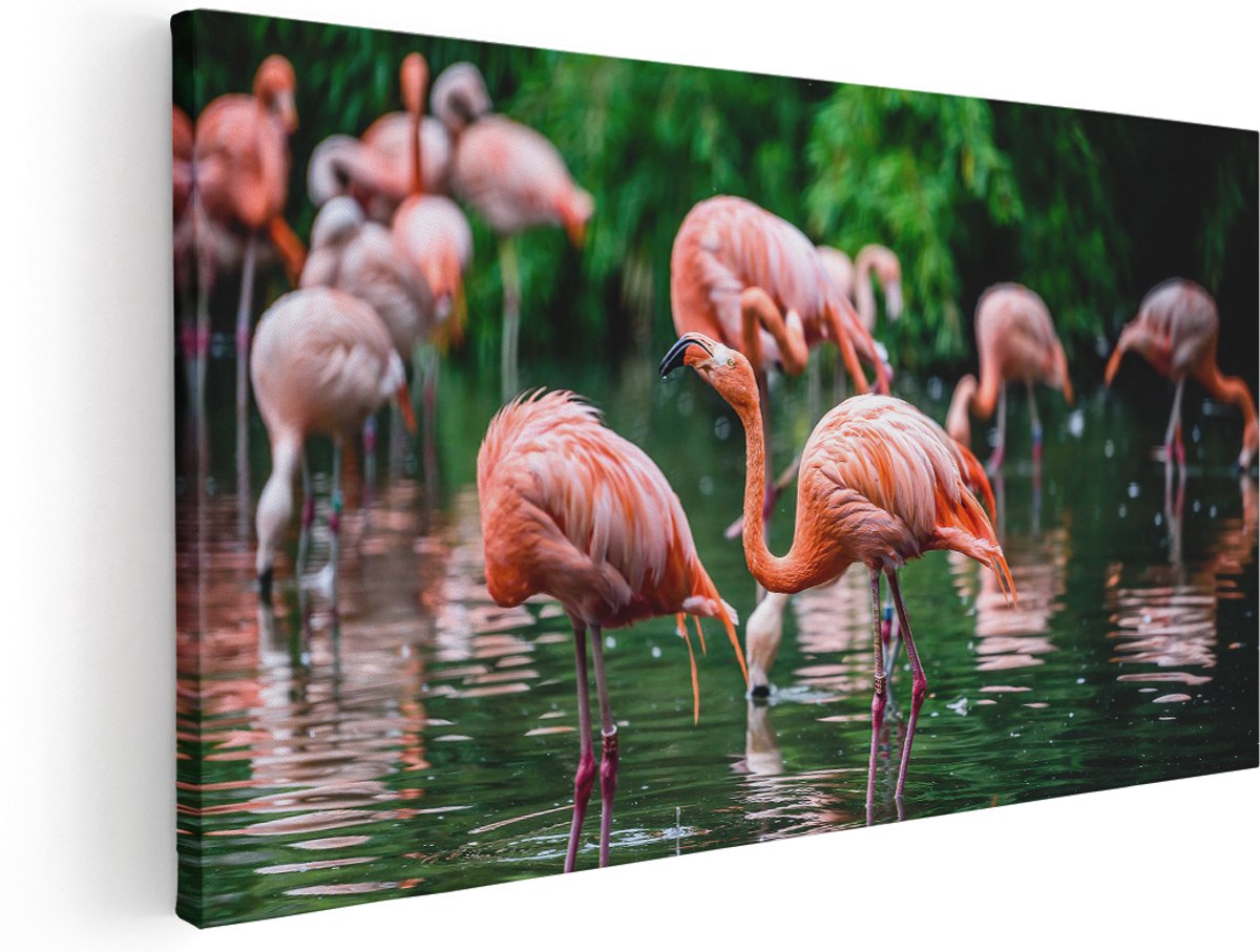 Artaza Canvas Schilderij Kudde Flamingo's in de Jungle in het Water - 140x70 cm - Groot - Wanddecoratie Woonkamer - Schilderijen - Muurdecoratie