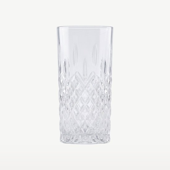 Verre transparent à long drink avec motif en losanges en bas et lignes verticales en haut.