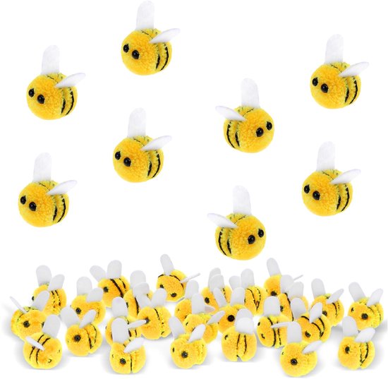 Grote groep kleine, pluizige, gele viltbijtjes met zwarte strepen en witte viltvleugels op een witte achtergrond.