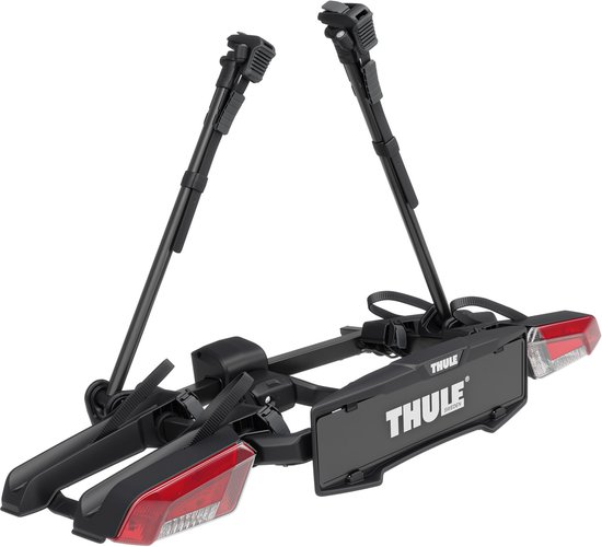 Porte-vélos noir Thule avec feux arrière rouges.