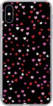 Geschikt voor iPhone Xs Max hoesje - Een illustratie met hartjes op een zwarte achtergrond - Siliconen Telefoonhoesje