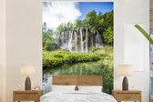 Behang - Fotobehang Watervallen in het bos van het Nationaal park Plitvicemeren - Breedte 195 cm x hoogte 300 cm