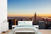 Behang - Fotobehang New York - Skyline - Zonsondergang - Breedte 360 cm x hoogte 240 cm
