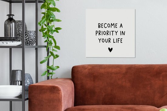 Tableau sur toile Citation anglaise Devenez une priorité dans votre vie avec un coeur sur fond blanc - 50x50 cm - Décoration murale