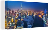 Peinture sur toile Dubaï comme une ville lumineuse la nuit - 80x40 cm - Art Décoration murale
