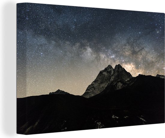 Canvas Schilderij Melkweg over bergen Nepal - 60x40 cm - Wanddecoratie