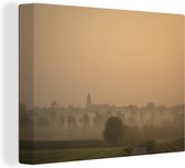 Canvas Schilderij Uitzicht een oranje lucht boven Essen in Duitsland - 120x90 cm - Wanddecoratie