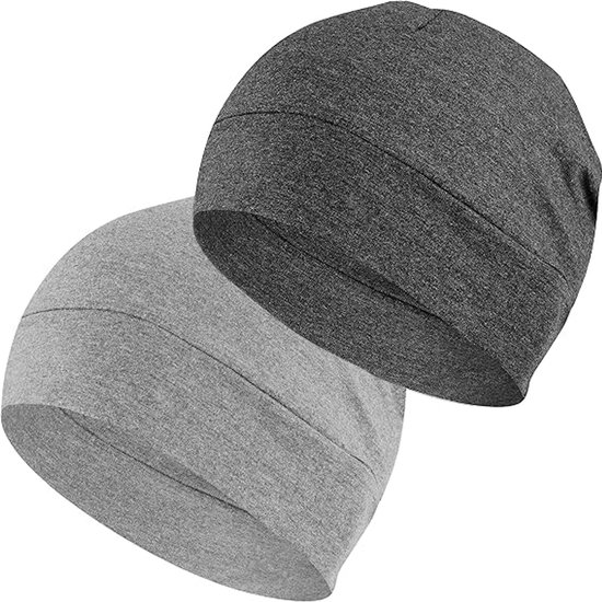 Twee katoenen skullcaps, één donkergrijs en één lichtgrijs, met een strakke pasvorm.
