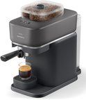 Zwarte Philips Baristina volautomatische espressomachine met een glas espresso.