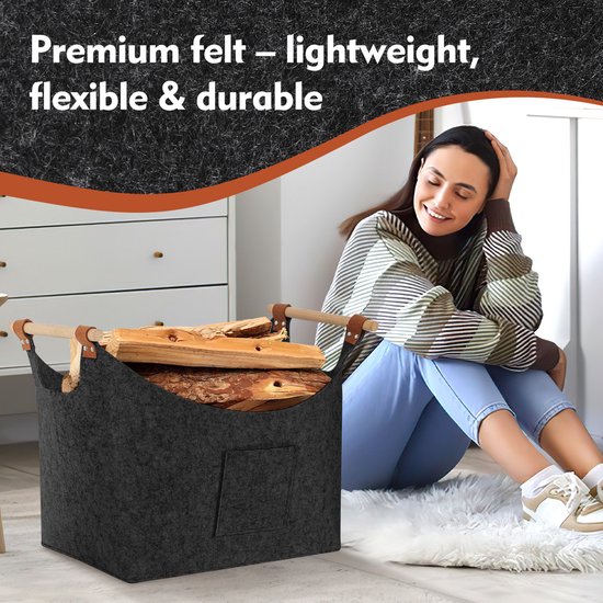 Vrouw bij donkergrijze vilten mand gevuld met hout. Premium vilt – licht, flexibel & duurzaam.