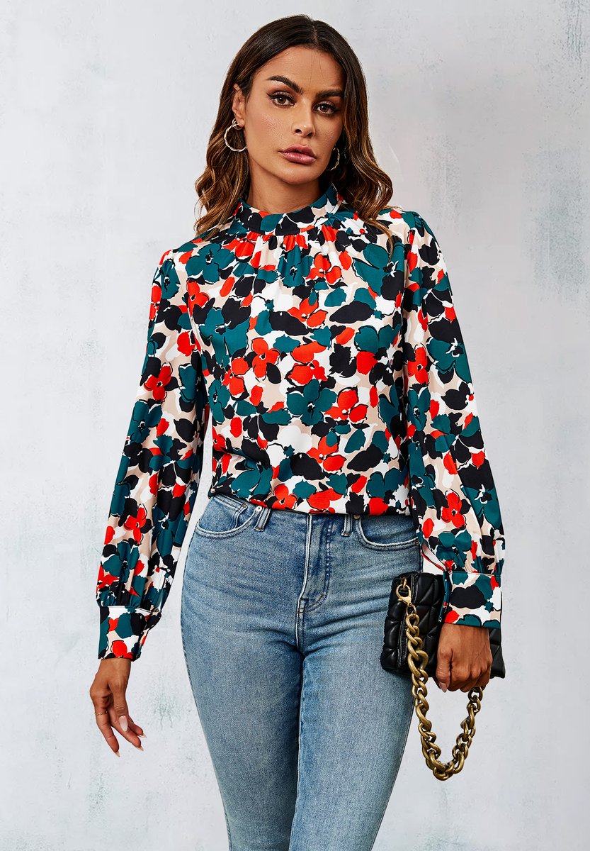 Top met lange mouwen en hoge hals en bloemenprint in blauw