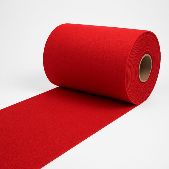 Un tapis rouge enroulé, déroulé sur un fond blanc.