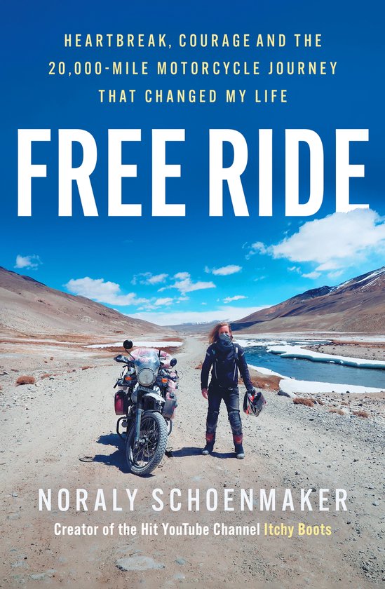Boek "Free Ride" met Noraly Schoenmaker op motor in ruig landschap.