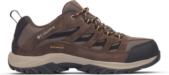 Bruine wandelschoen, met gele veters, mesh en 'WATERPROOF' opdruk.