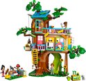 Een LEGO Friends-boomhut met speelfiguren, groen en bruin.