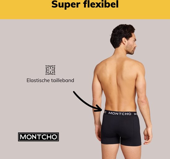 Model van achteren gezien, draagt een zwarte Montcho boxershort met elastische tailleband.