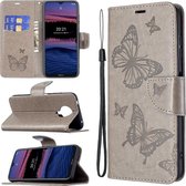 Mobigear Telefoonhoesje geschikt voor Nokia G20 Hoesje | Mobigear Butterfly Bookcase Portemonnee | Pasjeshouder voor 2 Pasjes | Telefoonhoesje voor Pinpas / OV Kaart / Rijbewijs - Grijs