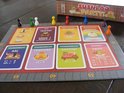 Speelbord van Sushi Go Party met kaarten voor Nigiri, Temaki, Wasabi en Fruit dessert.