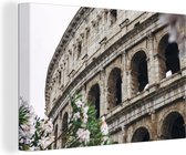 Canvas Schilderij Close-up van het Colosseum in Rome - 30x20 cm - Wanddecoratie