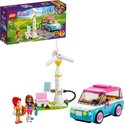 LEGO Friends-set met windmolen, zonnepanelen, stoel, hondenmand met hond, en een turquoise auto met roze dak en twee poppetjes.