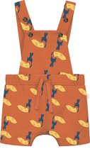 Smitten Organic Tuinbroek Ginger Spice kleur met all-over toucan-banaanprint