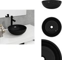 Collage d'un lavabo rond noir brillant en verre trempé.