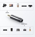 Zwart-gouden adapter toont conversie van 3,5 mm naar 6,35/6,5 mm, met voorbeelden van apparaten zoals pc's, telefoons en piano's.