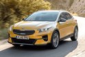 Gele Kia XCeed 2019-heden, rijdend over een weg