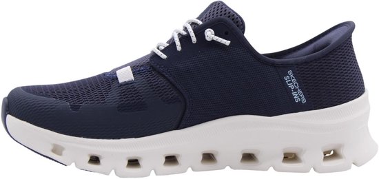 Donkerblauwe Skechers sneaker met witte veters, witte zool en opdruk 'SKECHERS SLIP-INS'.