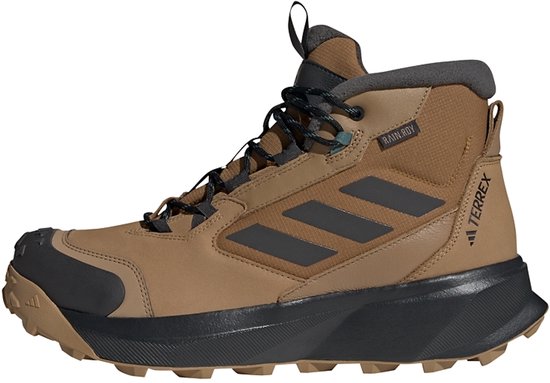 Bruine Terrex mid-cut wandelschoen met zwarte zool en RAIN.RDY-logo, studio-opname.