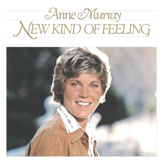 Anne Murray, "New Kind Of Feeling". Portret van Anne Murray met bruin jasje en witte blouse.