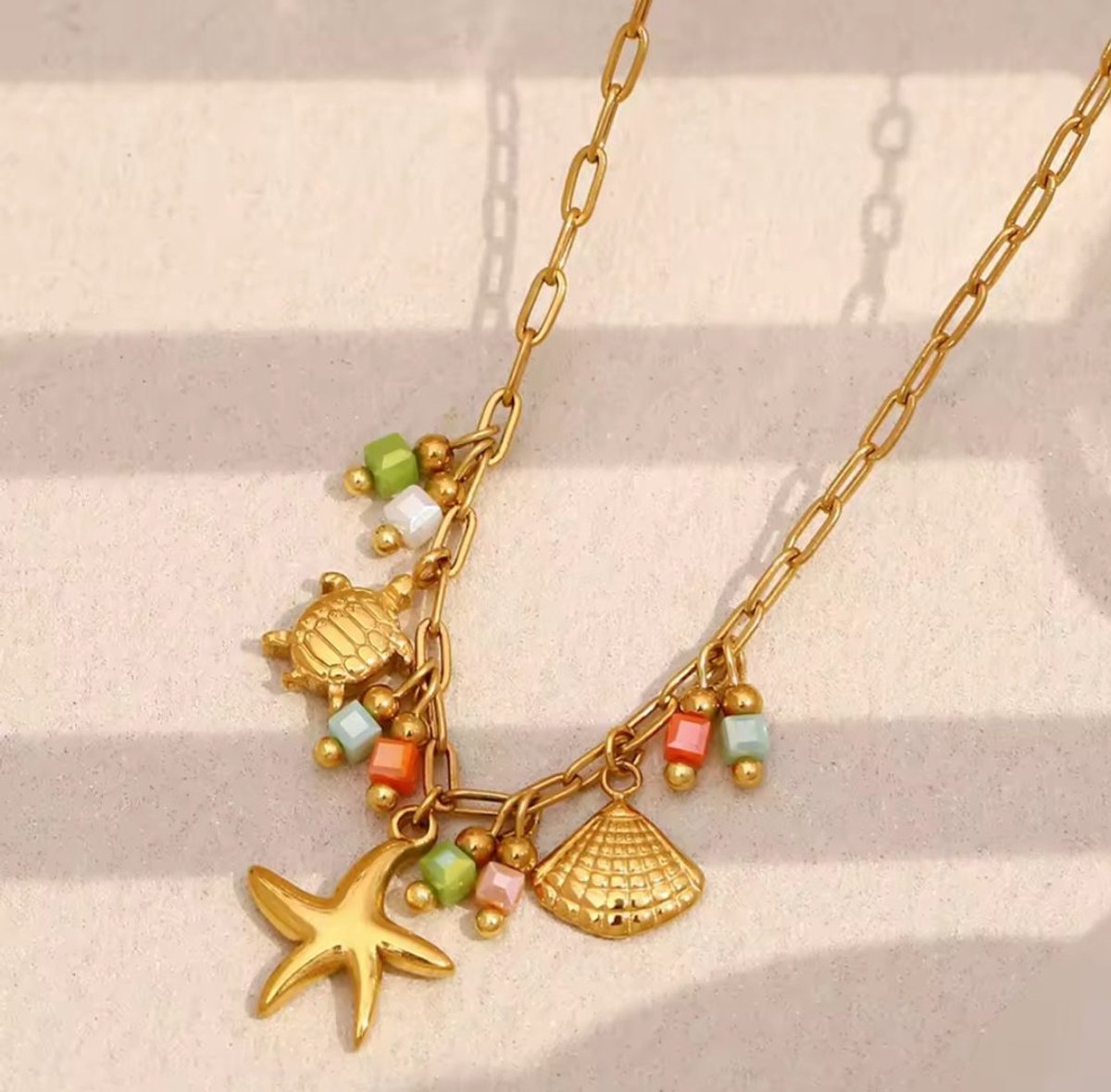 Boho kleurrijke ketting in gouden tinten - leuke hangers - roestvrij staal