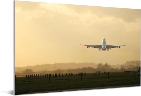 Un avion décollant d'un aéroport Aluminium 90x60 cm - Tirage photo sur aluminium (décoration murale métal)