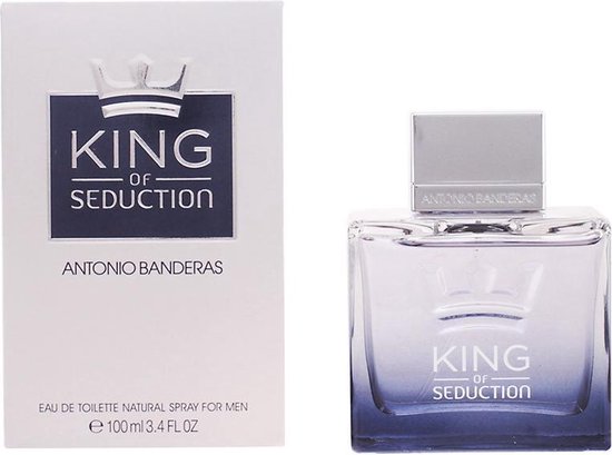 Fles Antonio Banderas King of Seduction eau de toilette 100ml, met zilveren dop en een gradiënt van lichtblauw naar donkerblauw, naast de verpakking.