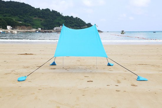 Foto: Strandtent pop up met zandanker draagbaar zonnescherm uv bescherming blauw