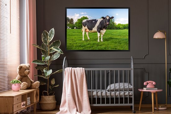 Vache Zwart et blanche dans le pré 120x80 cm