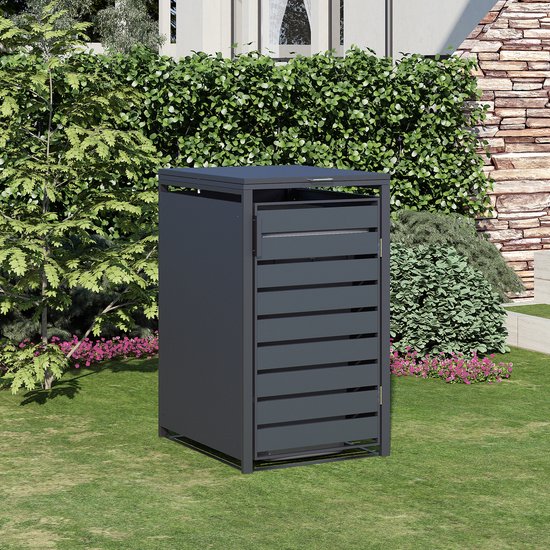 Donkergrijze kliko-ombouw met horizontale lamellen en een open dak in een tuin.
