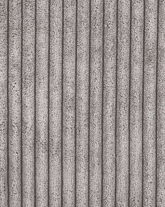 Textuur van lichtgrijs corduroy stof met verticale ribbels.