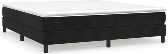 Boîte à ressorts noire avec matelas blanc.