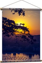 WallClassics - Textielposter - Zon achter Takken - 60x80 cm Foto op Textiel