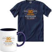 90 Jaar vintage legend - Verjaardag cadeau - Kado tip - T-Shirt met mok - Meisjes - Navy Blue - Maat 12 jaar